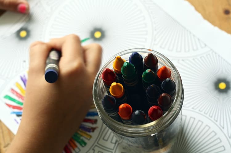 Children coloring together